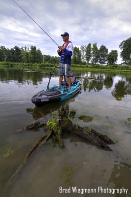 Brandon Coulter standing up fishing